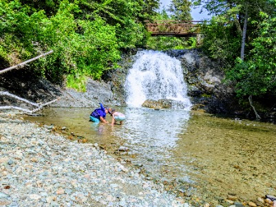 Child playing in Wawa Creek Falls