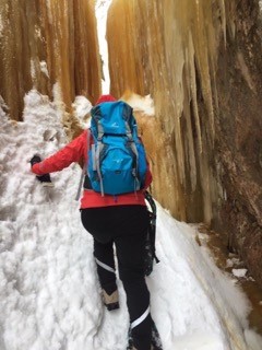 Woman walking through canyon